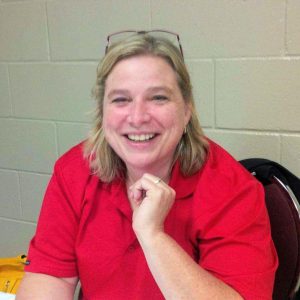 A photo of Deb Aben, facing the camera and smiling.