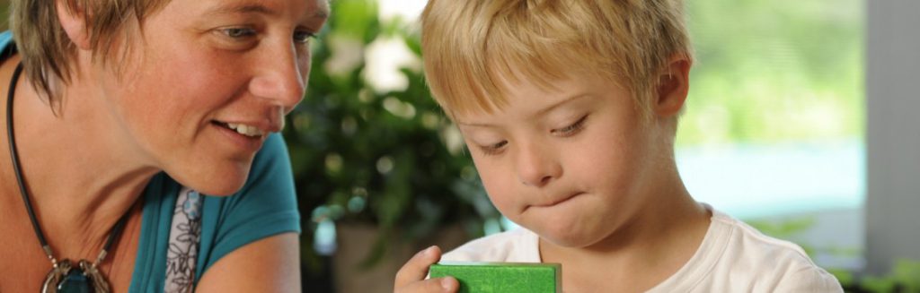 Educational assistance fund. Mother helping child.