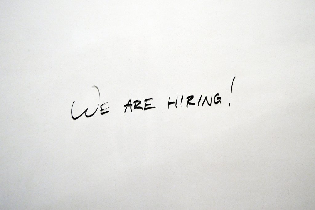 The words "we are hiring!" written in black on a white background.