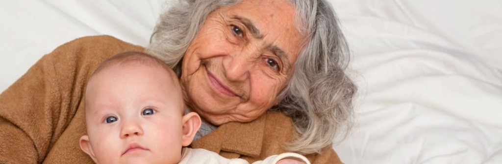 Great Grandma holding her great granddaughter