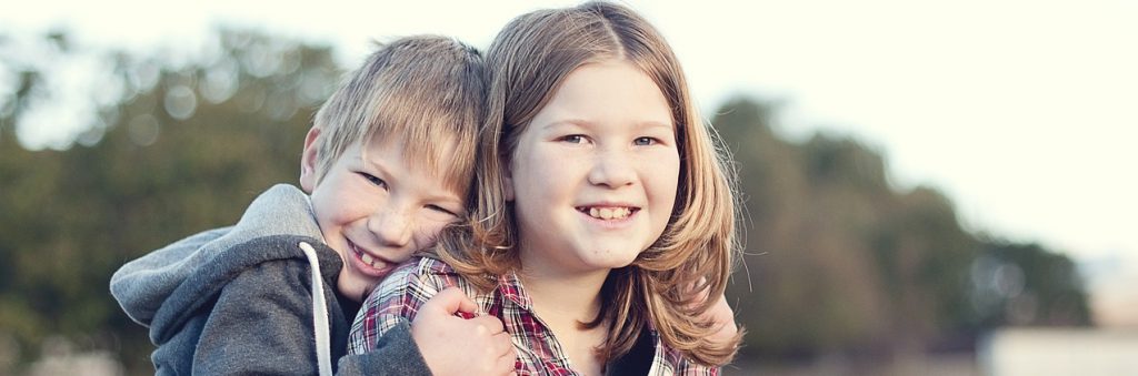 Children, boy and girl, outdoors